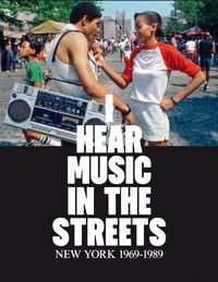 I HEAR MUSIC IN THE STREETS.